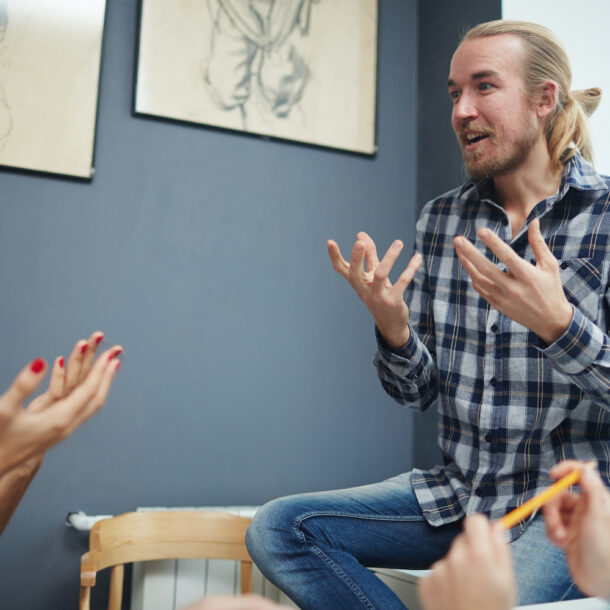 A group of young people having an engaged discussion.