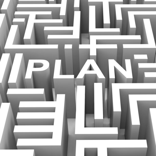 The word "Plan" outlined in a maze graphic.