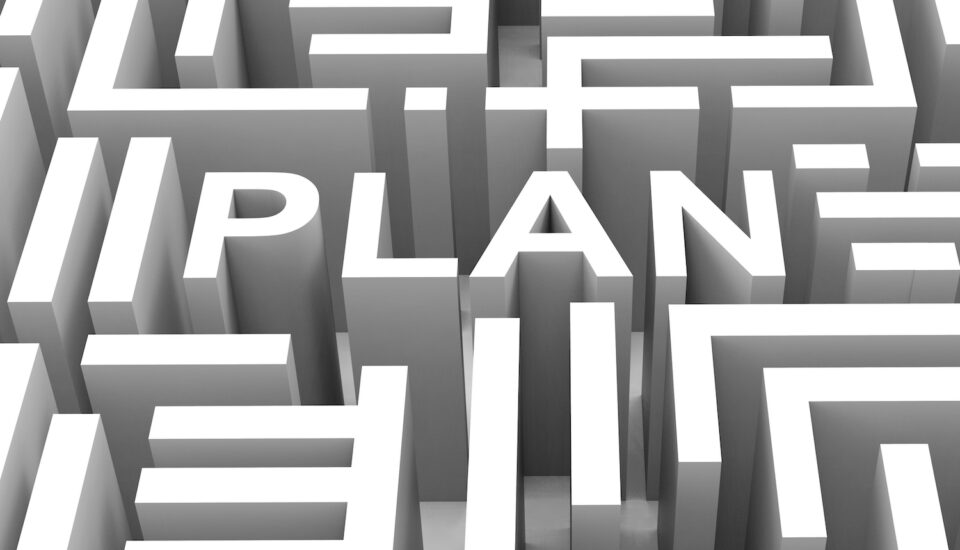 The word "Plan" outlined in a maze graphic.