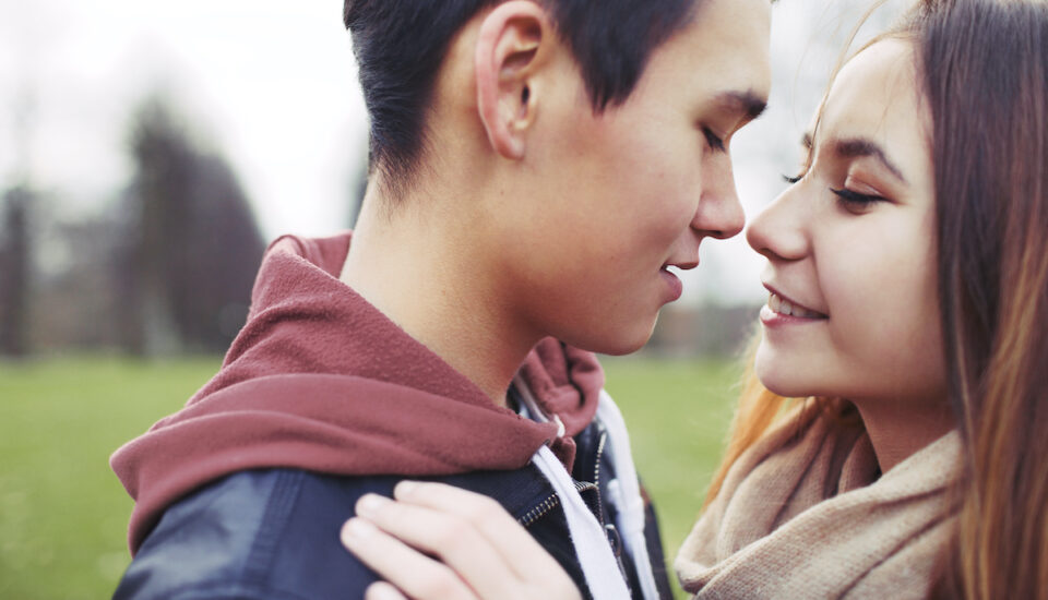 Close up image of a young couple in love.