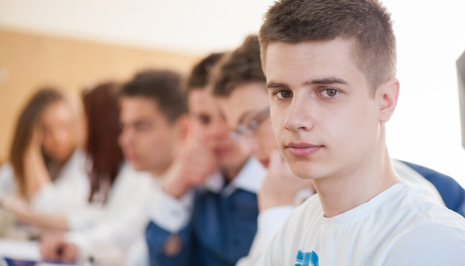 High school student in a classroom.